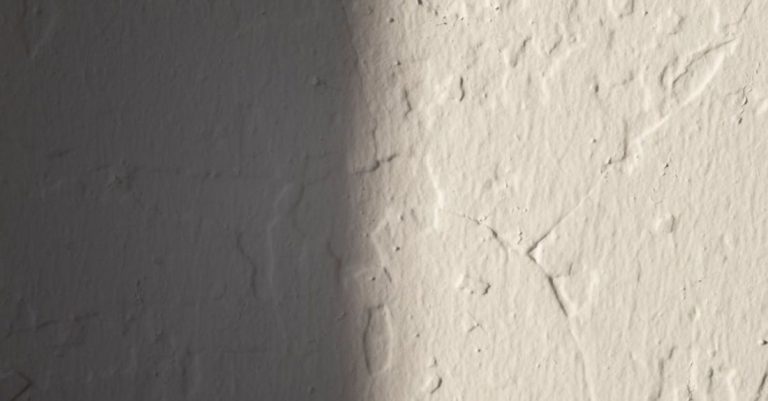 Neglect - Rough concrete wall of white color