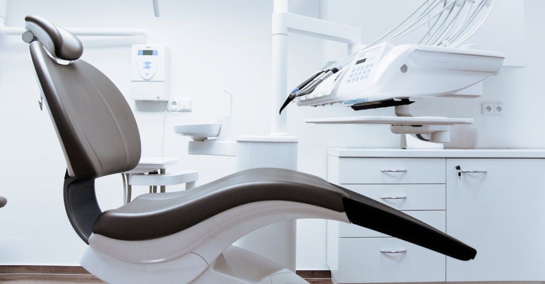 Dental Care - Black and White Dentist Chair and Equipment