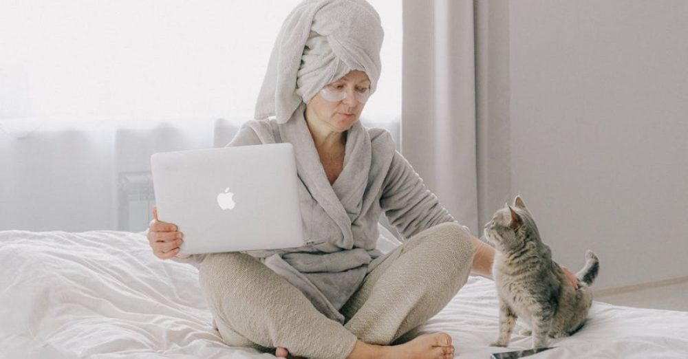 Bathe Cat - Woman in Gray Bathrobe Using Macbook