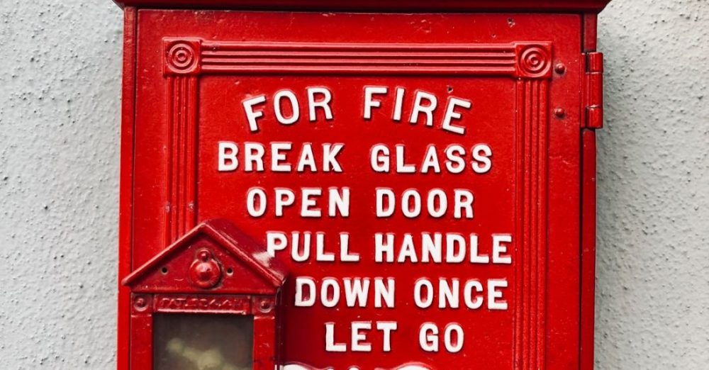 Emergencies - A red fire box with the words for break open the door