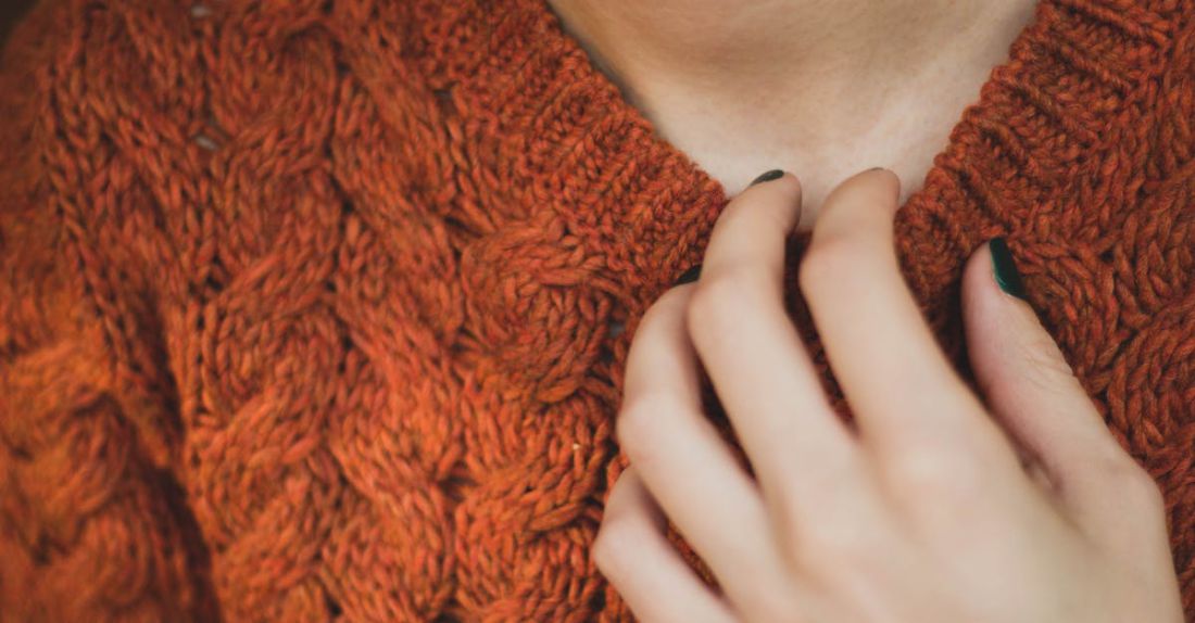 Collar - Person Holding on Brown Knitted Sweater