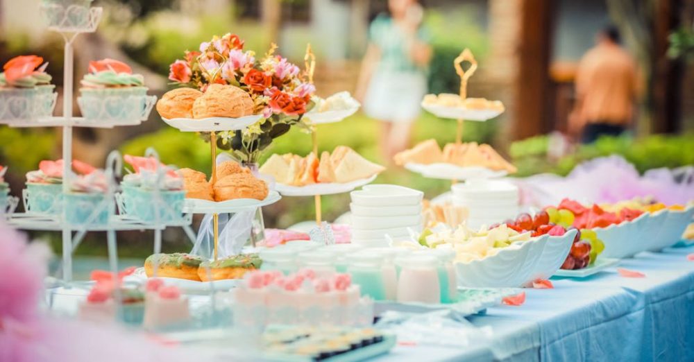 Welfare Events - Various Desserts on a Table covered with Baby Blue Cover